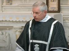 Father James Jackson, FSSP, delivers the homily at the funeral Mass for slain Boulder police officer Eric Talley on March 29, 2021, at the Cathedral Basilica of the Immaculate Conception in Denver, Colorado